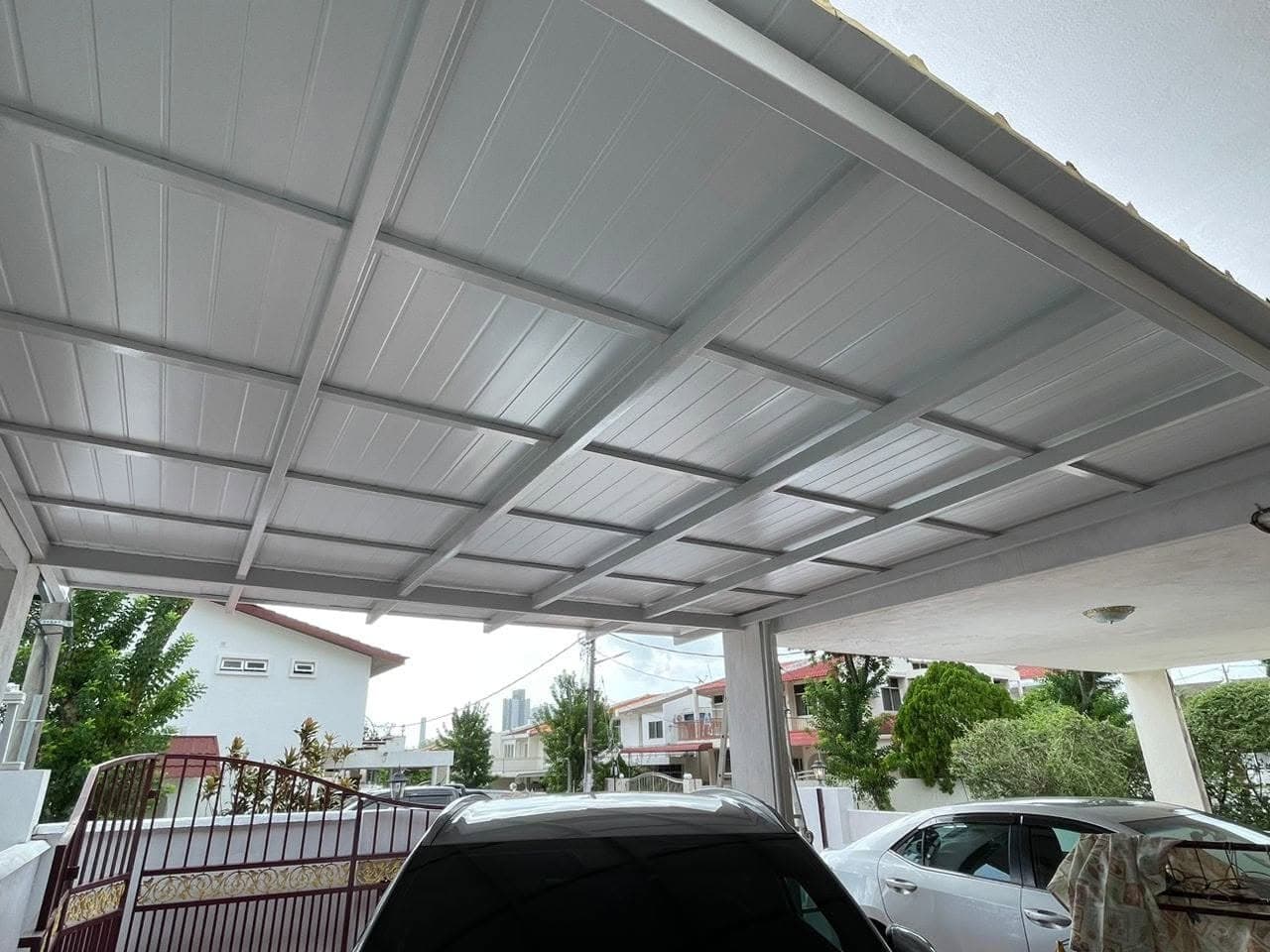 Car porch awning extension project by One Roof Solutions