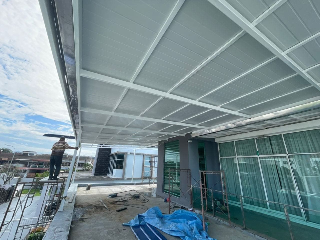 Wide roof awning extension project by One Roof Solutions